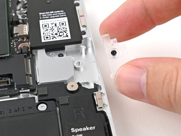 Remove the Wi-Fi module cover.