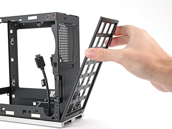Use your fingers to pull the Front Panel off the magnets securing it to the chassis.