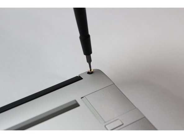 Using the T5 bit in the Framework Screwdriver, screw all 5 fasteners back into the Bottom Cover.