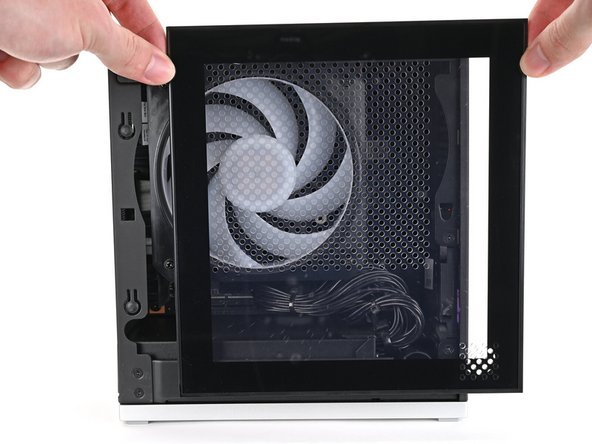 Slide the Left Panel onto the left edge of the chassis and press it flat to ensure its clips are slotted into place.