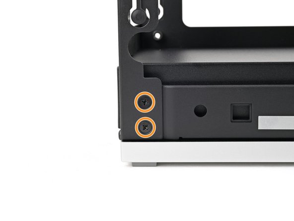 If you removed the rear plate, use your Framework Desktop Screwdriver to install the six 4.0 mm‑long screws securing the rear plate.