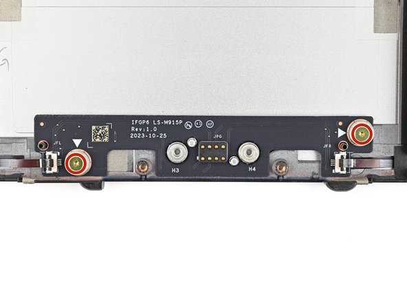Use your Framework Screwdriver to install the two 3.6 mm‑long screws securing the Expansion Bay Shell Fan Board.