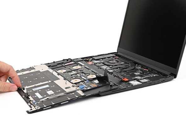 Flip the Input Cover over the laptop and align the bottom edges.