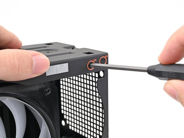 While holding the Desktop steady, use your Framework Desktop Screwdriver to remove the eight 4.0 mm‑long Phillips screws securing the top plate.