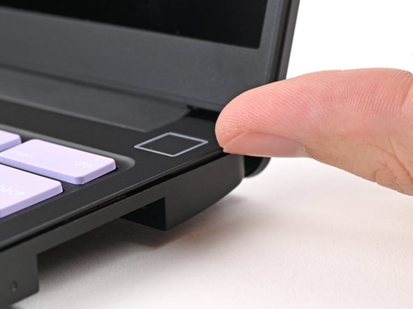 Flip over your laptop and open it.