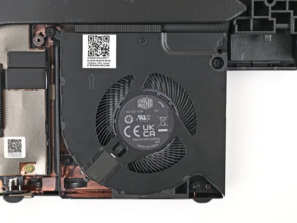 Use a T5 Torx screwdriver to tighten the four captive screws securing the fan.