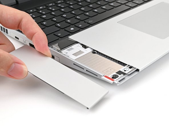 Repeat the same procedure for the other touchpad spacer.