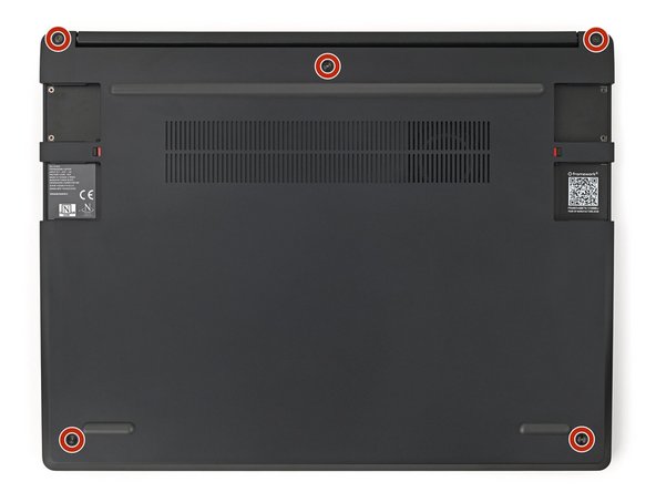 Use your Framework Screwdriver to loosen the five captive T5 Torx screws securing the Input Cover.