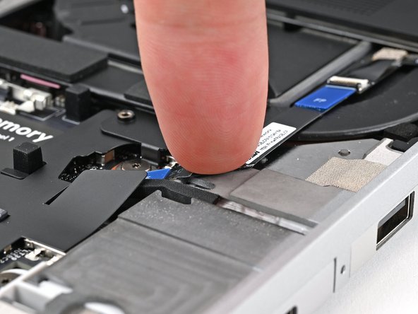 Press the fingerprint sensor cable to the frame to re-adhere it.