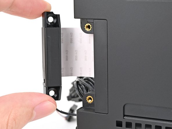 The left antenna has a long, black antenna cable with a white tip.