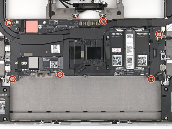 Use your Framework Screwdriver to install the six 2 mm‑long T5 Torx screws securing the Mainboard.