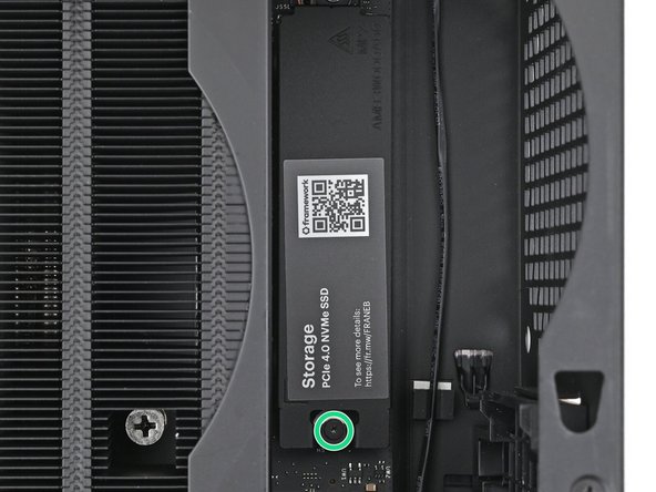 Tighten the screw securing the SSD.