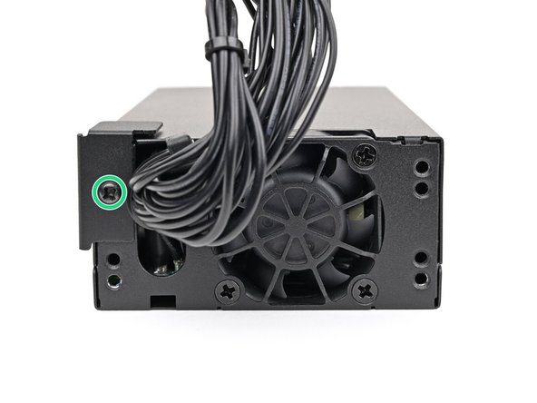 Use your Framework Desktop Screwdriver to Install the 5.8 mm‑long Phillips screw securing the mounting bracket.