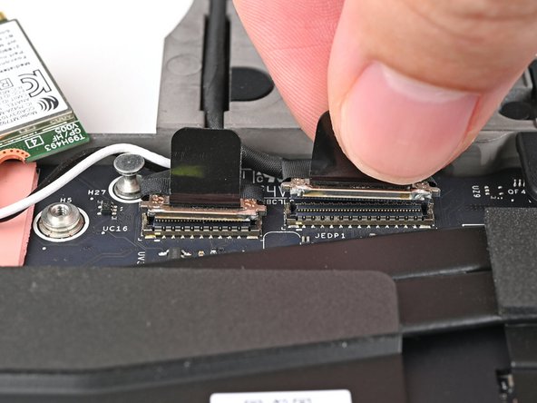 Press the two display connectors straight down into their sockets to connect them.