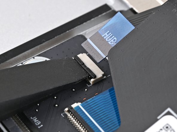 Repeat the previous three steps to connect the Fingerprint Reader Cable on the Hub Board.