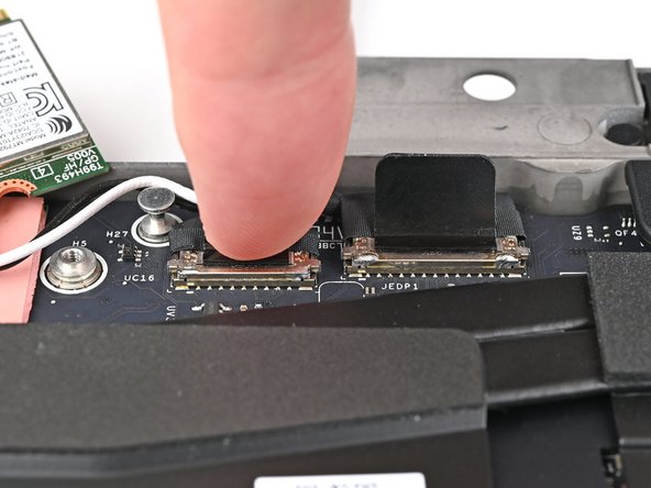 Press the two display connectors straight down into their sockets to connect them.