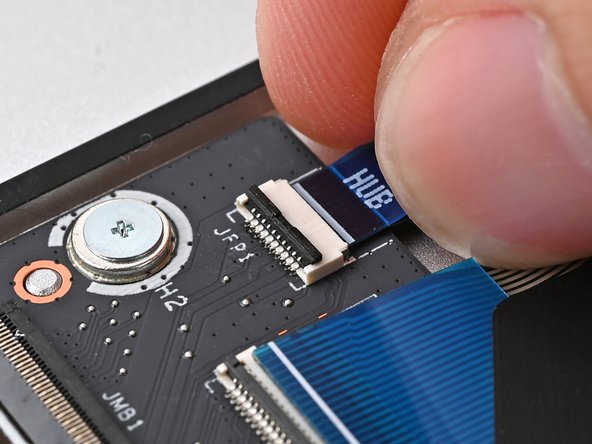 Repeat the previous three steps to connect the Fingerprint Reader Cable on the Hub Board.