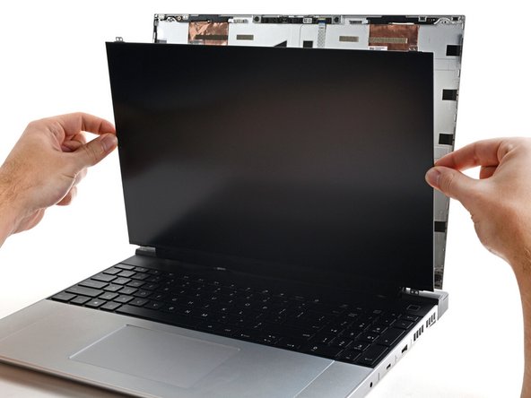 Don't pull the display too far from the Top Cover, as it's still attached by a cable.