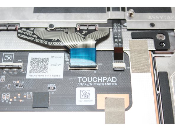 Slide the cable in until the white line is almost at the edge of the connector.