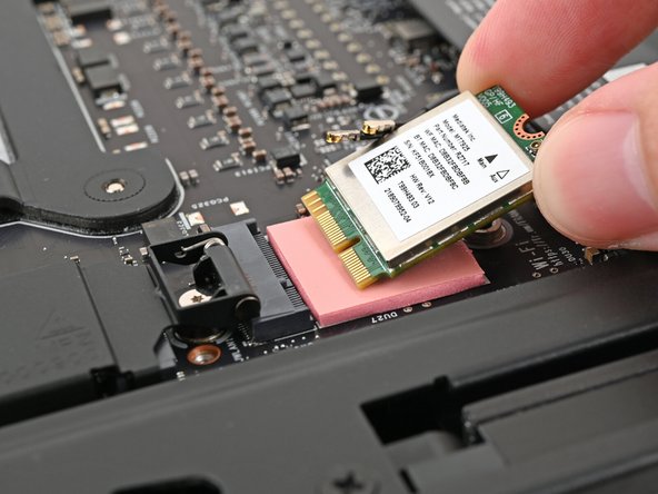 Remove the Wi-Fi module.