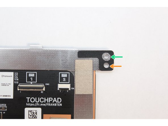 The Touchpad Module has a black spacer on the top left and right corners.