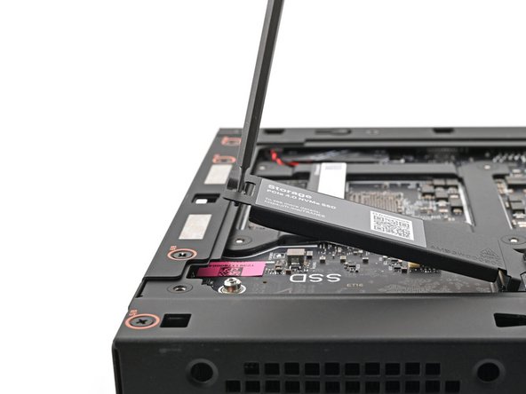 The heat spreader will pop up to an angle when its screw is fully loosened.