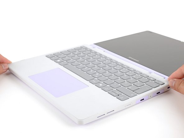 Make sure the slots along the bottom edge of the Input Cover slide into the tabs in the base.