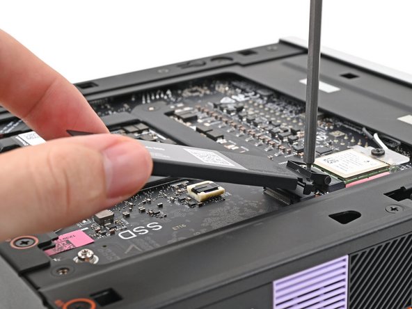 If your SSD comes with a pre-installed heat spreader, follow the next two steps. Otherwise this and the following step.