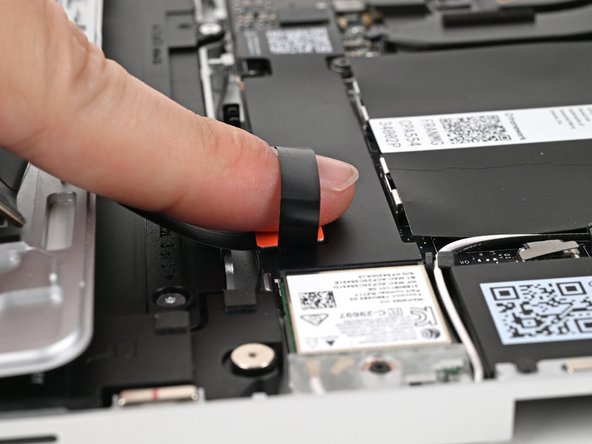Align the press connector over its socket and press down with your finger.