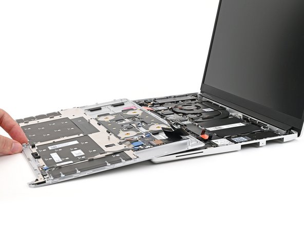 Flip the Input Cover over the laptop and align the bottom edges.
