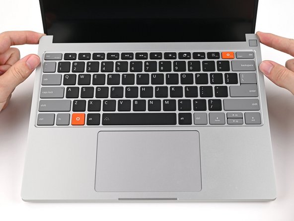 Lay the Input Cover over the laptop and let the magnets snap it into place.