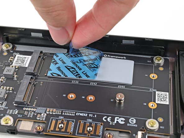 Remove the blue liner to expose its top side.