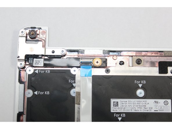 Flip the black latch down to secure the cable.