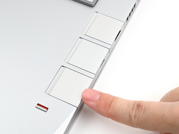 Slide an Expansion Card into an Expansion Card slot.