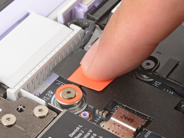 Align and press the webcam cable straight down onto its connector.