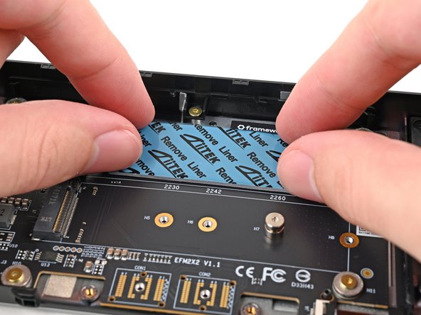 Place the thermal pad over its spot on the adapter.