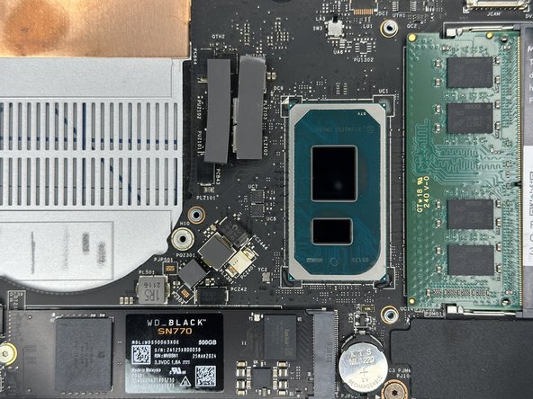 Place the Heatsink and Fan module on the Mainboard aligning it carefully with the processor.