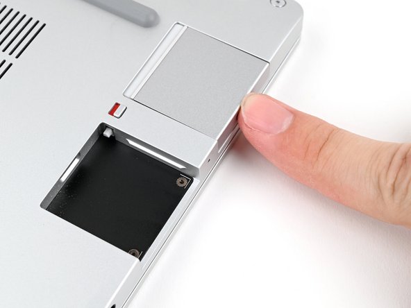 Slide an Expansion Card into an Expansion Card slot.