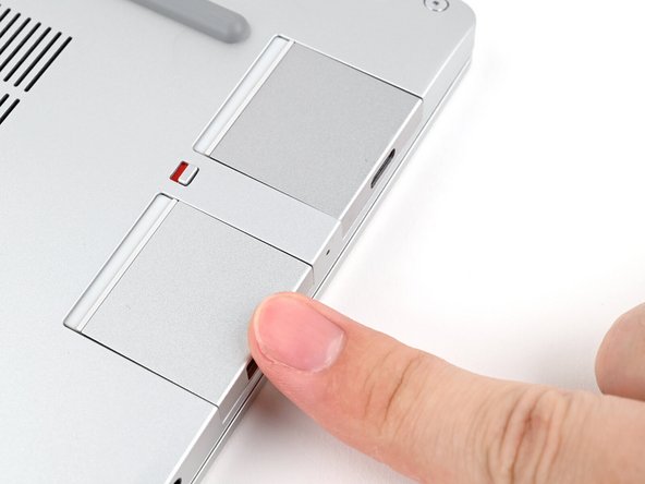 You don't need to unlock the latch to install the Expansion Cards—only when you want to remove them.