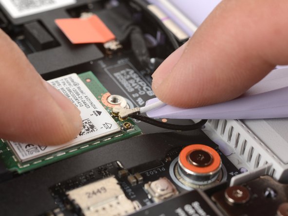 Press and hold the Wi-Fi card down with your finger.