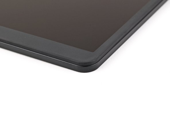 Use your fingers to press around the edge of the Bezel. The magnets should easily snap into place.