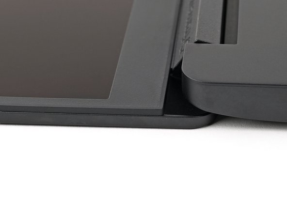 Check that all four corners of the Bezel sit flat on the screen. If they're uneven, do the following: