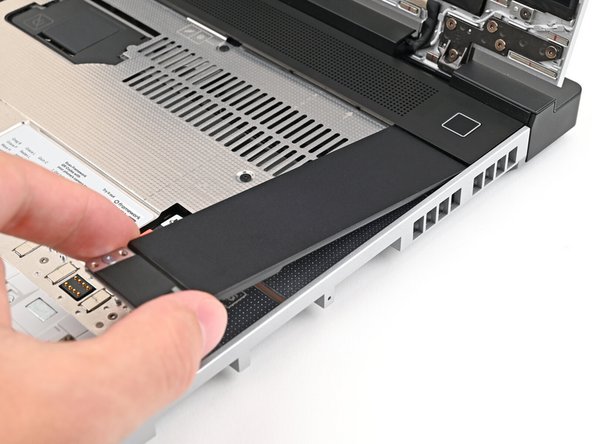 Slide the top lip of the Input Module underneath the ventilation plate and lay the module down flat to let the magnets pull it into place.