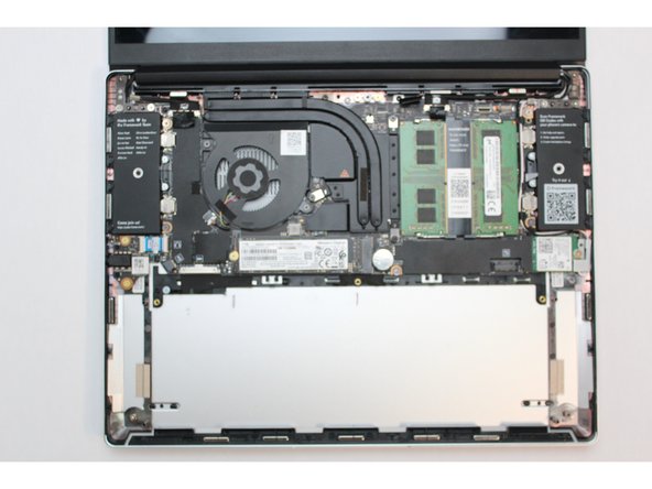 The speakers are now disconnected.  You can lift both the left and right speaker out of the Bottom Cover.