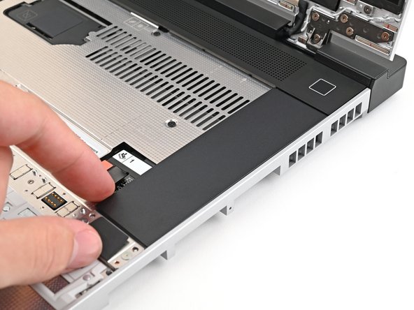 Make sure the alignment pegs are slotted into the Input Module and that it sits flat. Otherwise, pull the module off the laptop and readjust it.