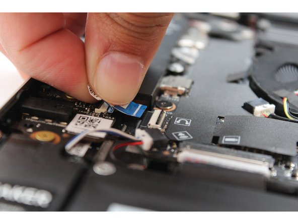 Insert the Audio Cable back into the Mainboard. Make sure the black latch is flipped up so that you can slide the cable into the connector.