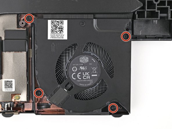Use a T5 Torx screwdriver to loosen the four captive screws securing the fan.