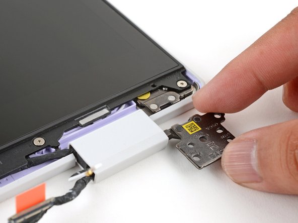 Use your fingers to twist the right hinge plate until it's flipped on top of the display.