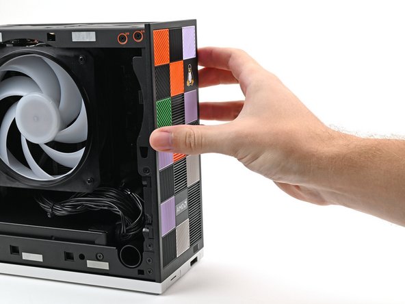 Use your fingers to pull the Front Panel off the magnets securing it to the chassis.