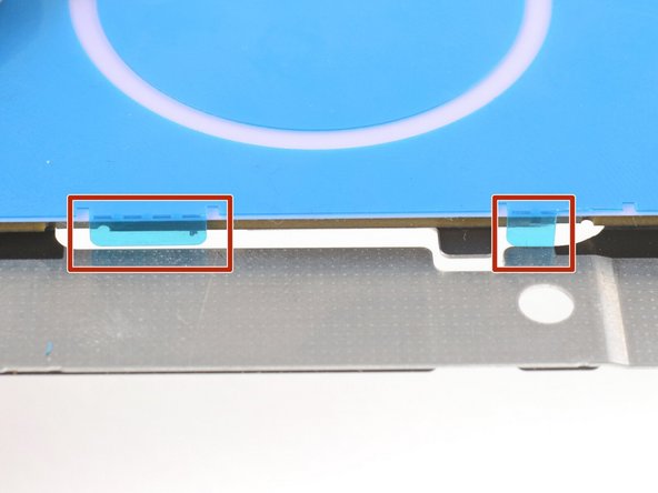 The replacement touchpad comes with a blue plastic alignment tool pre-installed. Don't remove this from the touchpad yet.